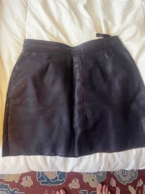 Plum leather mini skirt size 38/4